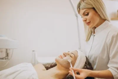 Woman visiting cosmetologist and making rejuvenation procedures